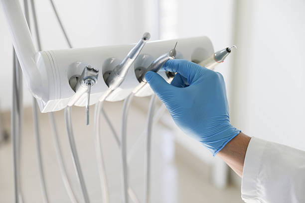 Professional Tooth Extraction technician working in Port LaBelle, FL
